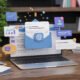 3D laptop showcasing email marketing automation and customer engagement icons for business communication